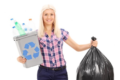 Professional skip hire team assisting with waste disposal in Hayes